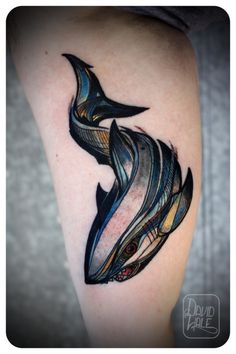 an artistic tattoo design on the leg