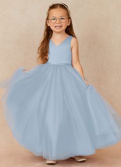 Wedding bells are ringing as Marybell introduces the blushing bride. This flouncy tulle angel is the perfect beauty for your special day. She’s a satin classic with a bow on top. Tulle Princess Dress For Bridesmaid Prom Season, Tulle Princess Dress For Bridesmaid At Prom, Spring First Communion Tulle Gown, First Communion Gown With Tulle Skirt, Spring Confirmation Gown In Tulle, Spring Tulle Gown For Confirmation, Spring Confirmation Gown Made Of Tulle, Sleeveless Tulle Gown For Confirmation, Spring Princess Tulle Bridesmaid Dress