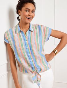 Our easy button front top with extended shoulder seams. Crafted from breezy linen with a swing stripe pattern. Elevated with a chic tie at the hem that looks fabulous from office to date night. Features Short Sleeve Hits Above Hip Shirt Collar Button front closure Wrap hem Imported Fit: Misses: 24"; Petite: 23"; Plus: 26 1/4"; Plus Petite: 25 1/4" Material: 100% Linen Care: Machine Wash Cold; Only Non-Chlorine Bleach When Needed; Tumble Dry Low; Cool Iron, If Needed | Linen Tie Hem Button Front Striped Linen Top With Button Closure, Striped Linen Tops For Work, Button Front Top, Classic Style Women, Summer Outfit Inspiration, Women's Shirts, Blue Blouse, Shirt Collar, Perfect Shirt