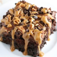 chocolate turtle poke cake with caramel drizzle on top