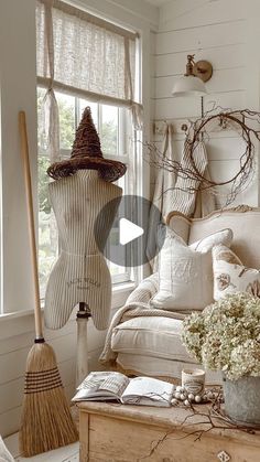 a living room filled with lots of furniture and decor on top of a wooden table