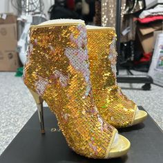 New Without Box. Gold Sequin Peep-Toe Ankle Boots With Stiletto Heel And Zipper Closure. Size Eu 37 Us 6.5. Please See Photos For More Details. Peep Toe Ankle Boots, Bond Paper Design, Bond Paper, Gold Sequin, Stiletto Heel, Luxury Shoes, Paper Design, Stiletto Heels, Bootie Boots