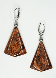 The earrings are one of a kind and handmade from Bocote wood and have very smooth and brilliant cut  surface. Lever backs are Rhodium  plated. Care instructions: Avoid direct contact with perfumes, alcohol, water and other solvents that may damage wood finish. Wipe jewelry with soft dry cloth. Unique Brown Teardrop Earrings, Brown Teardrop Earrings For Formal Occasions, Modern Brown Earrings For Gift, Formal Brown Teardrop Earrings, Modern Brown Earrings For Formal Occasions, Modern Brown Drop Earrings, Unique Brown Jewelry For Formal Occasions, Elegant Natural Wood Jewelry For Gift, Elegant Brown Hypoallergenic Earrings