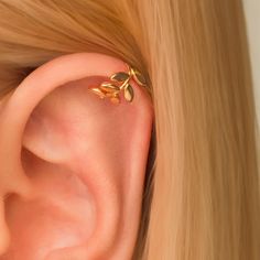 Leaf Ear Cuff Earring ♡ PRODUCT DETAILS: - 18K Gold Vermeil - Vermeil is a strong high-quality plating over sterling silver. It has no nickel in it which makes it    to be the perfect option for those who have metal allergies - Slightly adjustable (gently press it with your fingers at the place where you would like it to stay) - No piercing required - Inner diameter ~8mm - Width - 7mm - Lightweight - Hypoallergenic - Packed in a beautiful gift-ready packaging Sold as a single piece or as a pair Leaf Ear Cuffs, Cuff Earring, Wrap Earrings, Ear Cuff Earings, Have Metal, Cuff Earrings, Gold Vermeil, Favorite Jewelry, Ear Cuff