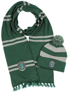 a green scarf and hat with harry potter crests on the side, both in grey and white stripes