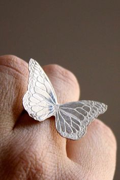 Sterling silver monarch butterfly ring is the piece of statement jewelry you'll reach for again and again. The detailed design is a realistic replica of a butterfly making it a jaw-dropping gift idea. #giftforher #statementjewelry #giftidea #jewelry #cocktailring Engraved Sterling Silver Butterfly Jewelry, Silver Butterfly Jewelry For Wedding, Butterfly-shaped Sterling Silver Jewelry For Wedding, Unique Butterfly Sterling Silver Ring, Silver Sterling Butterfly Ring For Wedding, Sterling Silver Rings With Butterfly Charm, Silver Jewelry With Butterfly Charm, Silver Sterling Silver Rings With Butterfly Charm, Silver Butterfly Ring For Wedding