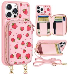 a pink phone case with strawberries on it and two wallets attached to the back