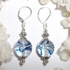 This Gorgeous Beaded Earring Set Was Done With Clear Glass Beads With Navy Blue Swirls. The Pair Have Silver Toned Costume Jewelry Beads That Were Antiqued In Black. They Dangle And Drop From 925 Sterling Silver Lever Backs For Women's Pierced Ears. Measure 1 3/4 Inches Tall & Almost 5/8 Inches Wide. Each Single Earring Weighs 4.3 Grams. A Cute Set To Wear With Denim Jeans! Brand New & Handmade By Me - Wvluckygirl. Great Gift Idea For Her! Buy It Now Before Someone Else Does!!! Dangly Dangling E Elegant Adjustable Beaded Glass Earrings, Blue Teardrop Jewelry With Silver Beads, Elegant Hypoallergenic Glass Jewelry, Nickel-free Blue Beaded Earrings For Gifts, Nickel-free Blue Beaded Earrings As Gift, Blue Silver Beaded Drop Earrings, Blue Silver Beads Drop Earrings, Blue Glass Round Bead Earrings, Blue Round Bead Glass Earrings