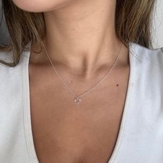 The gorgeous minimalist sterling silver necklace features a tiny open heart that moves freely along the chain ... share the ♥ with the love in your life, your mum, sister or bff. It's super cute on and perfect for those who like to wear dainty pieces or love layering! 💖 Details 925 Sterling Silver Pendant: approx 7 mm  Length: choose from 40, 42 or 45 cm 💕 Online store: www.thejewellerytree.net 💕 Stay up-to-date with new designs & special offers  - FOLLOW ME   Socials: @myjewellerytree OR  https://www.facebook.com/thejewellerytree1/  💕 Need more info, feel free to email - I'd love to help 💕And please visit my store https://www.etsy.com/au/shop/TheJewelleryTreeCo  We care about the environment so when you buy any of our pieces, you'll receive beautiful long lasting jewellery with minim Open Heart Necklace, Necklace Layering, Silver Heart Necklace, Jewelry Tree, Layering Necklace, Necklace Dainty, Pretty Earrings, Open Heart, Fabric Bag