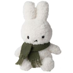 a white stuffed animal with a green scarf around it's neck