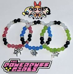 3 8mm beaded bracelets inspired by the characters blossom , bubbles , and buttercup from the power puff girls series . Power Puff Girls Bracelet, Friend Bracelet Ideas, 8mm Beaded Bracelets, Blossom Buttercup Bubbles, Ppg Blossom, The Power Puff, Bubbles And Buttercup, Blossom Bubbles And Buttercup