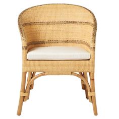 a wicker chair with a white cushion