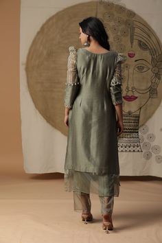 Featuring our olive green baggi suit set with puff sleeves and hand embroidery. Comes with ankle length pants and a dupatta. Fabric : CHANDERI SILK GREEN Color FIT FITTED Lining Material crepe 15 DAYS Delivery 3 Components Straight Kurta Set With Embroidered Sleeves For Diwali, Green Pant Set With Dupatta And Straight Kurta, Green Pant Set With Straight Kurta And Dupatta, Green Straight Kurta With Embroidered Sleeves, Green Embroidered Sleeve Straight Kurta, Festive Green Sets With Embroidered Sleeves, Festive Green Set With Embroidered Sleeves, Fusion Wear, Kurti Embroidery