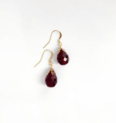 "These Victorian/antique style earrings date to c.1980s-90s and feature deep red Czech fire-polished glass beads.  The earrings measure a total of 3.5cm x 1cm = 1.5\". x 0.4 inches. The dangly part alone measures 2cm = 0.4 inches A matching necklace is listed separately: https://vivavintagejewels.etsy.com/listing/1586258530 There is a little nibble in one of the glass beads, otherwise they are in excellent condition. All jewellery is sent in presentation packaging. ALL INTERNATIONAL SHIPPING IS Dark Red Earrings, Earrings Antique, Red Earrings, Long Red, Dangly Earrings, Antique Earrings, Earrings Long, Style Earrings, Matching Necklaces