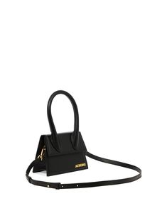 Jacquemus"Le Chiquito moyen" handbag100% leather18x13,5x9 cmLeatherReinforced handle;Magnetic flap tab closure;Adjustable, removable strap;Interior pocket;Gold metal logo and hardware;Fully lined;Painted edges Jacquemus Le Chiquito Moyen, Le Chiquito Moyen, Jacquemus Le Chiquito, French Brands, Black Shoulder Bag, Metal Logo, Metallic Logo, Black Handbags, Belt Bag