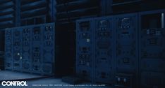 a man is standing in front of some electrical equipment with the words control written on it