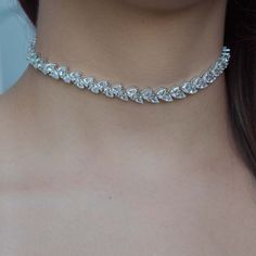 Our Pear-Shaped CZ Choker is a must have piece. It is truly a stunning and exquisite piece, that is so versatile. We use a THICK, DURABLE plating of 14K Gold, Rose Gold or Rhodium over brass - for a piece that will last you years to come! Highest Grade CZ for an authentic diamond look! Nickel-free & Hypoallergenic 29 cm + 3" Extension Gold Rose, Pear Shaped, Choker, Pear, Plating, Rose Gold, Brass, Silver, Gold