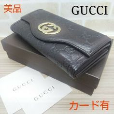 Auth Gucci Fold Purse #1412 InterRocking Long Wallet  GG Black Leather Italy Description Condition: B (Good Condition But Signs of Small Scratches and / or Stains) General: Signs of Wear, Scratches COIN PURSE / WALLET X 2, Card Holder x 12, COIN PURSE X 2 / Accessories: Shop Card Color Black Size (Approx): W 19cm H 10cm D 3cm Size (Approx): W 7.49inch H 3.94 Inch D 1.19inch Condition: B  N : (New)  S : (Almost brand new)  A : (Great condition Light signs of use with tiny scratches and/or stains) Gucci Brown Wallet With Card Slots, Gucci Brown Formal Wallet, Formal Brown Gucci Wallet, Gucci Bifold Wallet For Formal Occasions, Luxury Brown Gucci Wallet, Gucci Bifold Wallet With Original Box, Gucci Designer Wallet For Formal Occasions, Coin Purse Wallet, Lighted Signs