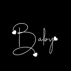 the word baby written in white ink on a black background with two hearts and an arrow