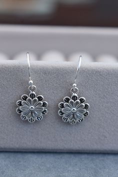 925 Sterling silver earrings with double flower design. These earrings will be backed onto a card backing board which can be recycled. Gift boxes are available at an extra cost, just send me a message. Earrings pictured in the final photo are also available in my shop. Free standard UK shipping via Royal Mail. Sterling Silver Flower-shaped Earrings, Sterling Silver Drop Earrings For Anniversary, Sterling Silver Flower Charm Earrings As Gift, Sterling Silver Dangle Flower Earrings For Gifts, Sterling Silver Flower Charm Earrings For Anniversary, Nickel-free Sterling Silver Flower-shaped Earrings, Sterling Silver Flower Charm Earrings, Silver Sterling Flower Pendant Earrings, Sterling Silver Flower Pendant Earrings As Gift