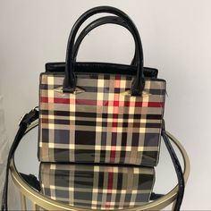 This Bag Is So Cute With Fall Outfits. It’s Sturdy And Medium Sized. Great For Storing Your Phone, Makeup, A Tablet, Some Chargers And So On. Like New With Tags Comes With Strap Black Square Satchel With Detachable Handle, Black Square Box Bag For Shopping, Trendy Black Square Satchel, Black Square Box Bag With Handles, Trendy Black Box Bag With Handles, Black Bag, Medium Bags, Medium Size, Black Red