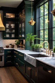 a kitchen filled with lots of counter top space next to a stove top oven and sink