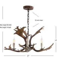 an antler chandelier with three candles hanging from it's center, and measurements