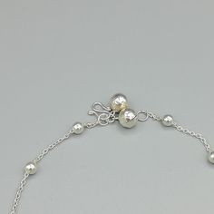 Sterling silver anklet with silver balls and tear drop charms. Comes with two 6mm bell. Length: 10 inches. Tear drop: 4 x 12 mm Ball: 3mm Price listed is for ONE piece. These anklets are made of 925 hypoallergenic sterling silver. All my pieces are sent in a gift box. I can include a personal message from you if needed. You are welcome to contact me at... bhavnakwintra1956@gmail.com More anklets https://www.etsy.com/shop/TheSilverGame?ref=seller-platform-mcnav&section_id=26713873 More hoops: Silver Anklets With Adjustable Chain For Parties, Festive Silver Adjustable Anklets, Elegant Sterling Silver Anklets With Adjustable Chain, Silver Adjustable Dangle Anklets, Silver Adjustable Chain Metal Anklet, Sterling Silver Anklet, Ear Climbers, Silver Anklets, Foot Jewelry