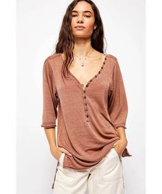 Effortless pull-on Henley top from our We The Free collection designed in a super soft lightweight cotton fabrication with button-front feature and dramatic wide sleeves in a slouchy silhouette. Effortless pull-on style V-neckline Lower back hem We The Free Perfectly distressed, all-American styles. We The Free is an in-house label. Care/Import Machine Wash Cold Henley Tee, Henley Shirt, Henley Top, Elbow Length Sleeve, Wide Sleeves, Henley Shirts, High Low Hem, Lower Back, American Style