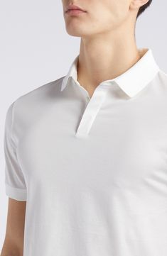 Classic and comfortable, this jersey polo made from soft cotton is always a great choice for everyday and keeps you looking as good as you feel. Button half placket Spread collar Short sleeves 100% cotton Dry clean Imported Elegant White Polo Shirt With Ribbed Collar, Classic Polo Shirt With Seamless Collar For Golf, Classic Golf Polo Shirt With Seamless Collar, Classic Relaxed Fit Polo Shirt With Seamless Collar, White Casual Polo Shirt With Seamless Collar, Casual White Polo Shirt With Seamless Collar, Elegant Cotton Polo Collar Top, Classic Relaxed Fit Tops For Golf, Elegant Cotton Polo Shirt With Seamless Collar