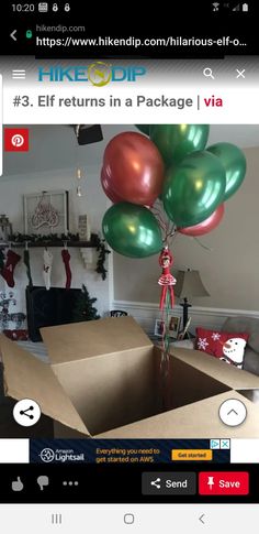 an open box with some balloons in it