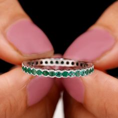 Product Details We know how Jewelry works charm for all our lovely ladies out there and so we bring this Gorgeous Eternity Ring for all our ladies who never go out of style. This Emerald Eternity Ring with Beaded Bezel Details is a must have Eternity Ring for all those special occasions, be it your Engagement, or a beautiful Valentine date night, this gemstone Ring will definitely charm everything up, so grab it now. Product Information SKU SHP-RINGS042165859 Width 1.8 mm Height 2.4 mm Weight 2. Valentine Date, Emerald Eternity Ring, Half Bezel Setting, Half Bezel, Jewelry Words, 18k Yellow Gold Ring, Anniversary Bands, Emerald Ring, Yellow Gold Rings