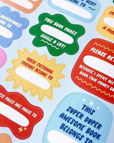 several stickers on the back of a book with words and phrases in different colors