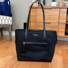 Brand New Kate Spade Diaper Bag Never Used “The Little Belt Chelsea Bag” Item Number: Wkr00642 Color: Black Nylon/Rayon Clip-On Strap: Adjustable To As Long As 45 Inches Or As Short As 29 Inches Length Of Bag: 15 Inches Height: 13 Inches Width: 7 Inches Top Zip Closure Front Zip Closure Comes With Changing Pad (Magnetic Closure) Kate Spade Nylon Bags For Everyday Use, Everyday Kate Spade Bag With Zipper Pocket, Kate Spade Everyday Bag With Zipper Pocket, Kate Spade Travel Bag With Zipper Pocket, Black Diaper Shoulder Bag With Zipper Closure, Everyday Black Diaper Bag With Zipper Pocket, Black Rectangular Diaper Bag With Zipper Closure, Black Large Capacity Diaper Bag For On-the-go, Black Diaper Bag With Zipper Closure For On-the-go