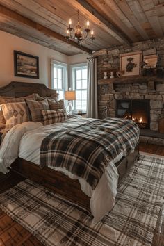 a bedroom with a bed and fireplace in it