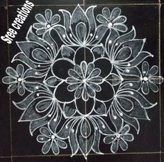 a black and white drawing of a flower on a tile floor with text overlaying it