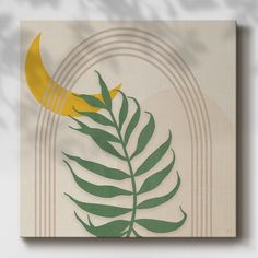 a green leaf with a yellow moon in the middle on a beige background that looks like it has been cut out