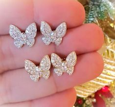 14k Gold diamond and gold with white finish butterfly earring. ( Price for one pair ) Gold Wt :- 2.40Gram Diamond Wt :- 1.60Ct.   14k Gold diamond and gold with white finish butterfly earring. Beautiful handmade 14k Gold diamond and gold with white finish butterfly earring. Light weight . perfect for gifting and wedding. We keep on adding new products & designs every day so keep coming back to get more deals & designs. Bulk & wholesale orders are welcome on this designs. kindly contact more than 5 pcs. of a kind. Butterfly Shaped Diamond Earrings With Accents, Butterfly Diamond Earrings With Diamond Accents, Butterfly-shaped Cubic Zirconia Earrings For Formal Occasions, Sparkling Diamond Earrings As A Gift, Silver Butterfly Fine Jewelry Earrings, Butterfly Diamond Earrings With Accents, Butterfly-shaped Diamond White Jewelry For Wedding, Butterfly Cubic Zirconia Earrings For Formal Occasions, Butterfly Cubic Zirconia Earrings For Formal Events