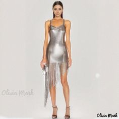 Olivia Mark - Chic Silver Metal Mesh Dress with Asymmetrical Fringe, Cowl Neck, and Backless Design Glamorous Asymmetrical Mini Dress For Club, Asymmetrical Bodycon Summer Evening Dress, Summer Evening Asymmetrical Bodycon Dress, Summer Cocktail Bodycon Dress With Asymmetrical Hem, Glamorous Asymmetrical Club Dress, Glamorous Party Midi Dress With Asymmetrical Hem, Glamorous Mini Dress With Asymmetrical Hem For Summer, Glamorous Asymmetrical Mini Dress For Summer, Glamorous Summer Mini Dress With Asymmetrical Hem