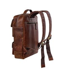 a brown leather backpack on a white background