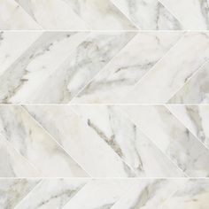 a white marble tile pattern that looks like herringbones