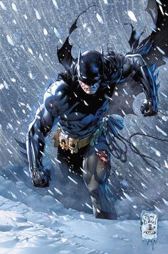 batman in the snow with his hands on his hips