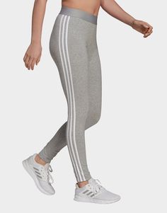 Clean, minimalist design inspires this everyday essential. Contrast 3-Stripes and a logo keep these women adidas leggings rooted in simple sporty style. Stretchy cotton makes them feel soft and comfortable.• Regular fit• 93% cotton, 7% elastane• 3-Stripes leggings Adidas 3 Stripes, Adidas Leggings, Timeless Wardrobe Staples, Striped Leggings, Grey Adidas, Jd Sports, Sporty Style, Adidas Women, Access Denied