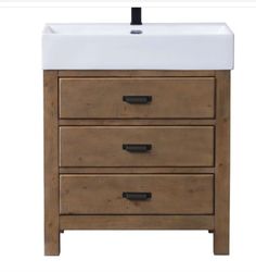 a bathroom sink with two drawers and a white counter top on an isolated white background