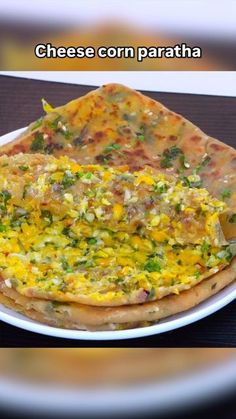 a plate with some food on it and the words cheese corn paratha above it