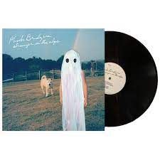 an album cover with a ghost standing next to a dog