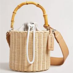 Jayriri Basket Weave Rattan Bucket Bag In Natural Rattan, Canvas And Faux Leather And Gold-Tone Hardware With Bamboo Top Handle Interior Design Details: Canvas Lining, Zippered Pocket Measures 6.5ln Wide X 6ln High X 6.5ln Deep Top Handle Drops 5ln Adjustable And Removable Shoulder Strap Drops 25ln Drawstring Closure Imported New With Tags Floaty Dress, Drawstring Bucket Bag, Rattan Bag, Picnic In The Park, Ted Baker London, Woven Top, Basket Weave, Basket Weaving, Isabel Marant