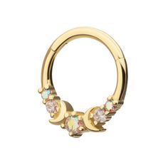 an open gold nose ring with multicolored stones