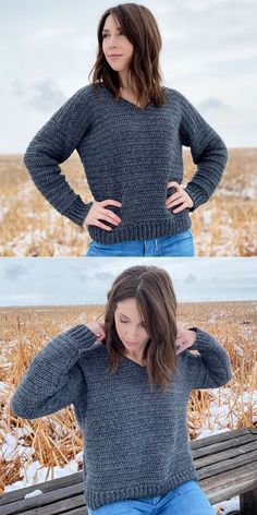 a woman is sitting on a bench in the snow wearing a gray sweater and blue jeans