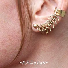 This ear cuff made with brass hammered ear cuff, brass textured "fish-bone" chain and 14K gold filled 5mm post earrings with 14K gold filled "butterfly" backing. 1.5" long from cuff to post.The ear cuff part is flexible enough to be shaped your ears.You can ether just wear one or two, really fun in both ways, when you get 2, you'll get $5 off :)~Thank you for stopping by & supporting handmade, have a Blessed day~~KR  :) Gold Metal Ear Climbers, Gold Bohemian Metal Ear Cuff, Bohemian Gold Brass Ear Cuff, Bohemian Gold Metal Ear Cuff, Ear Cuff Gold, Ear Cuff Chain, Faux Nose Ring, Sterling Silver Nose Rings, Tragus Ring